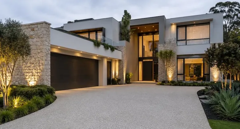 Rock salt concrete driveway finish at modern luxury home in Perth WA