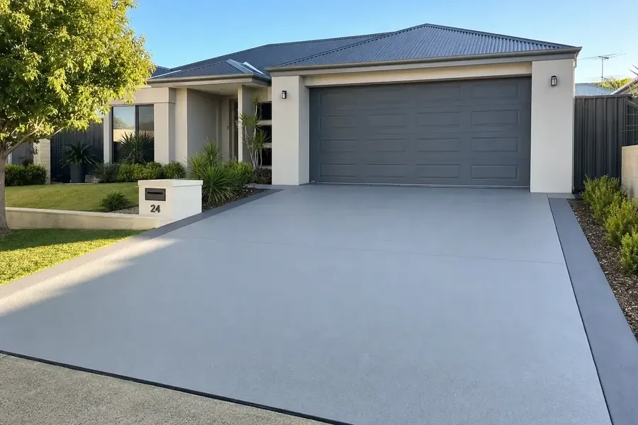 Resurfaced concrete driveway in front of a Perth home